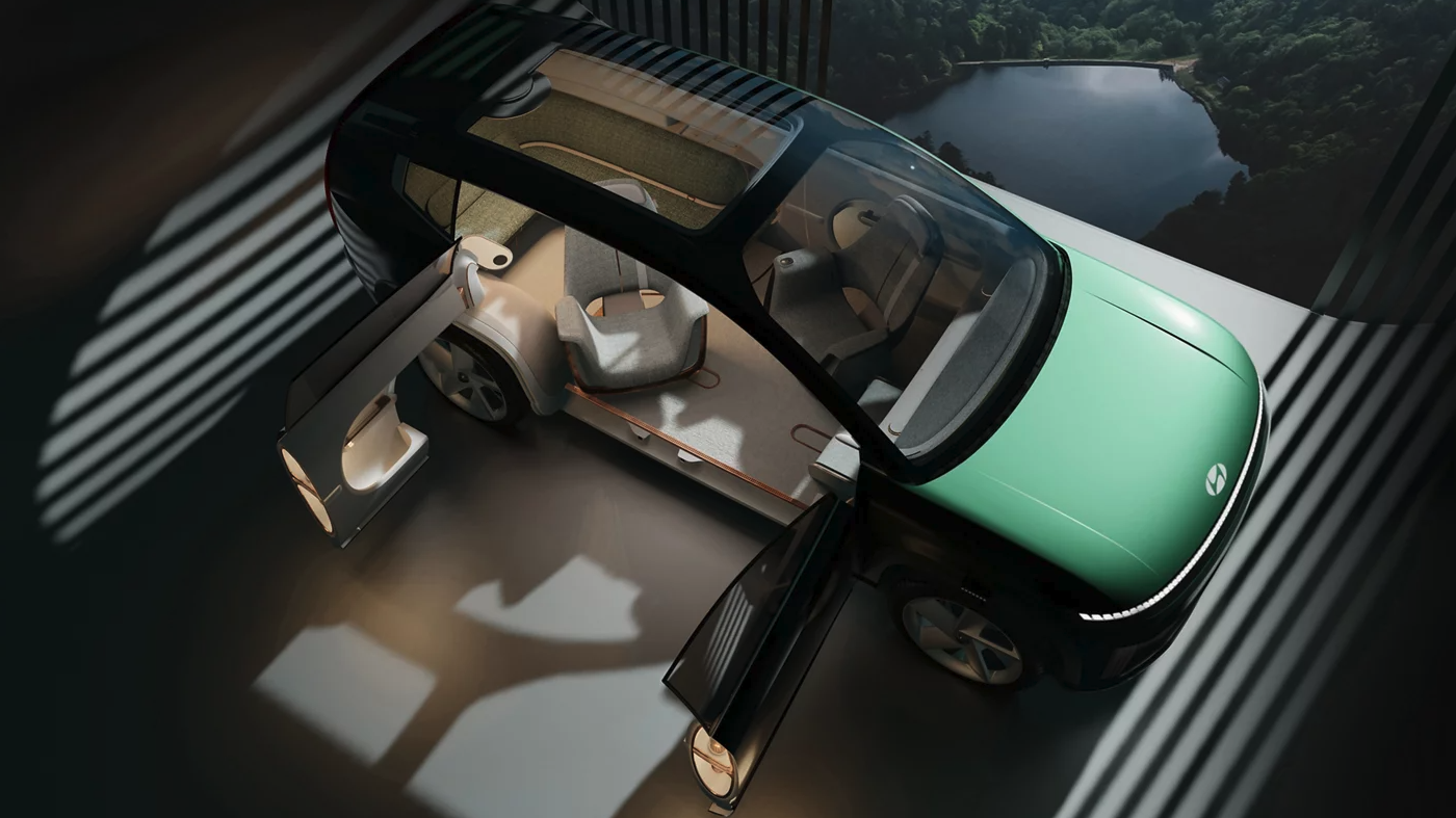 Overhead view of Hyundai's futuristic Ioniq EV SUV concept with open doors and panoramic glass roof